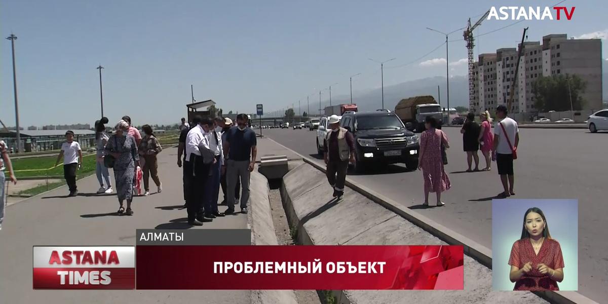 Проблемную развязку в Алматы пообещали достроить осенью